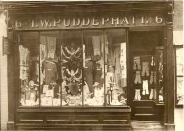 Shop front of Puddephatt's drapers store 6, Sun Street, Waltham Abbey showing T.W.Puddephatt's shop and The Perth Dye Works